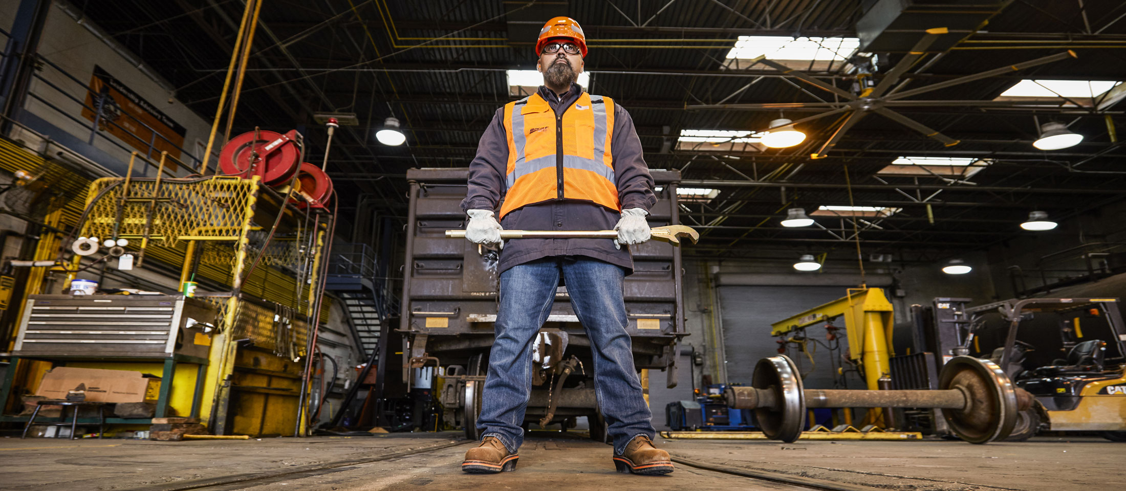 A man wearing the Thunderstruck 10” Waterproof Nano Comp Toe boots in brown.
